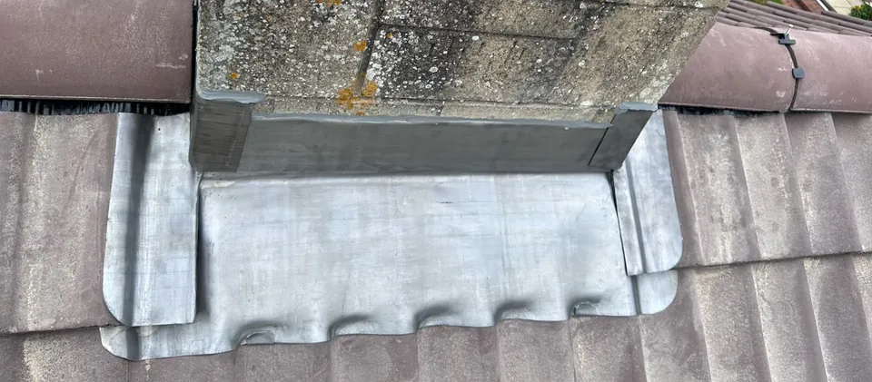 After: new lead apron at the same chimney