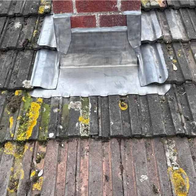 After: new lead dressed in around the same chimney
