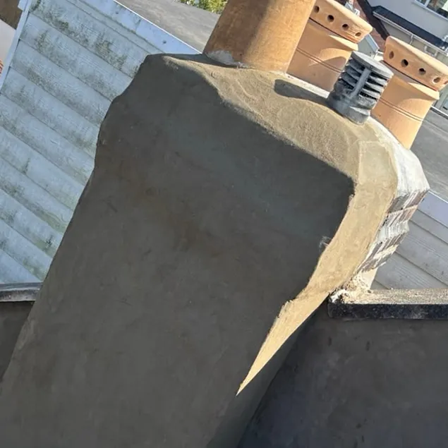 After: the same chimney stack rendered and made good