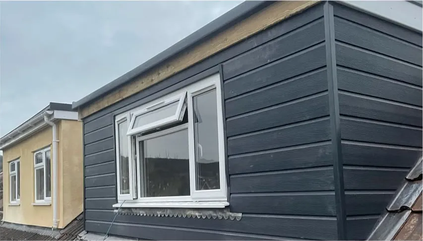 Dormer cladding with new window