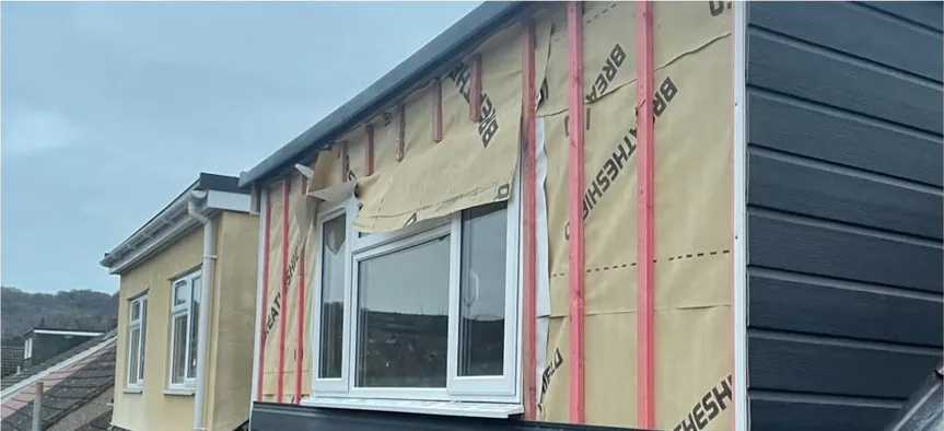 Dormer cladding going on over membrane