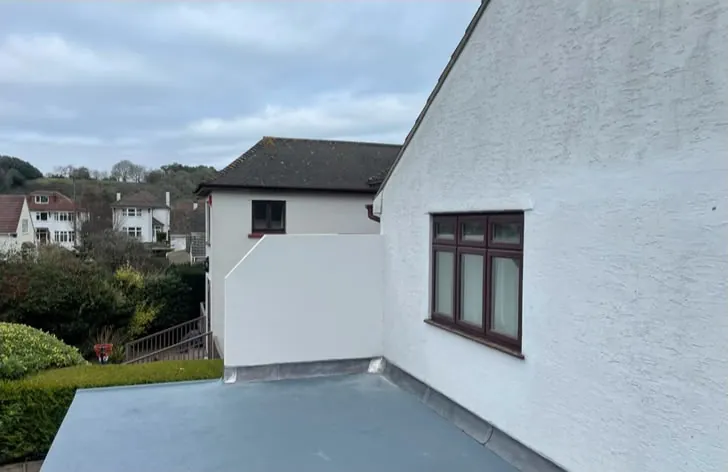 Finished flat roof with neat upstands