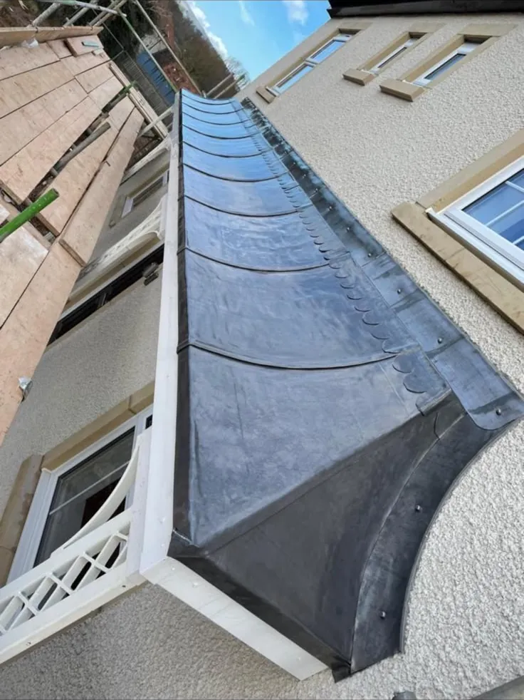Lead cheek on a dormer
