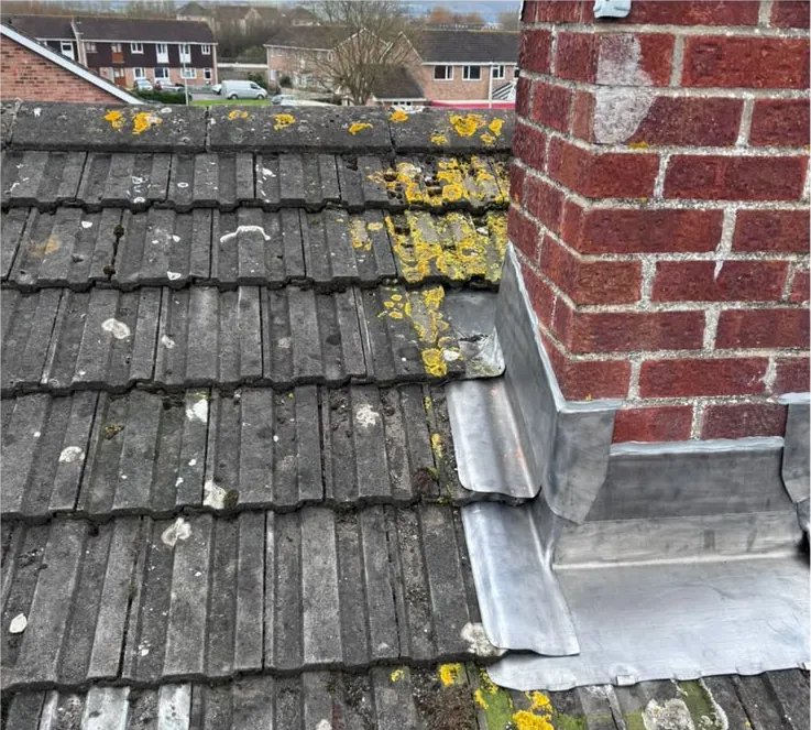 Lead flashings stepped up a chimney