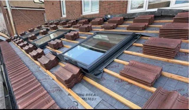 Tiling up to the new Velux windows